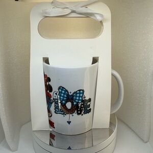 White Mug with Blue and Red Design